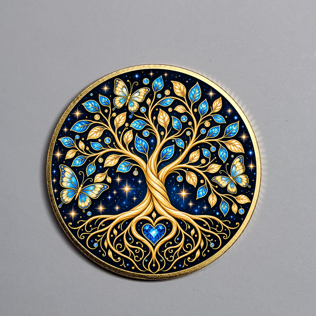Tree of Life recovery coin with a gold rim, blue and gold butterflies, and a heart at the roots