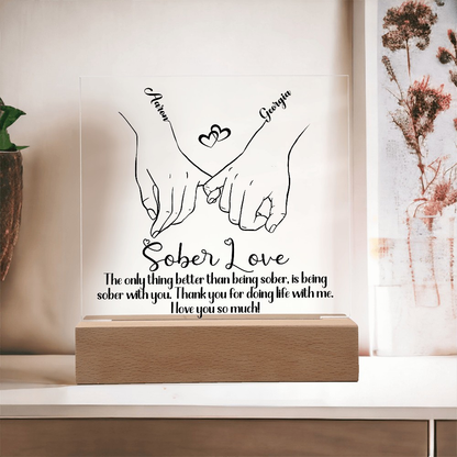 LED sobriety plaque with hands-heart design and message on wood base