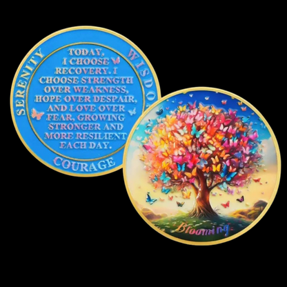 Sobriety coin, double-sided: blue text on one side, colorful butterfly tree on the other
