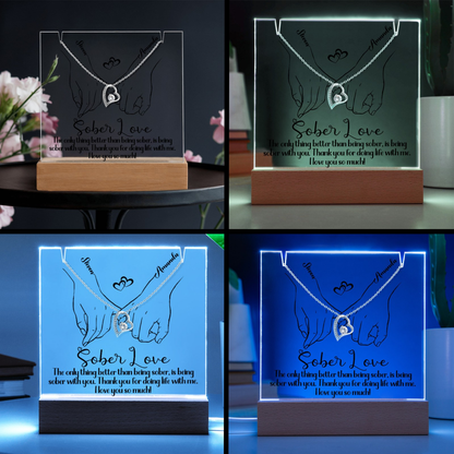 LED light base set showing glowing hands and heart pendant design in multiple colors