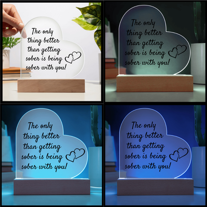 LED heart acrylic plaque with quote and heart icon on wood base, different lighting views