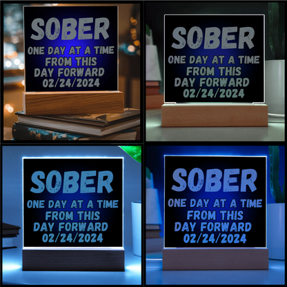 Square LED plaque with SOBER text and date, shown in multiple glowing border colors