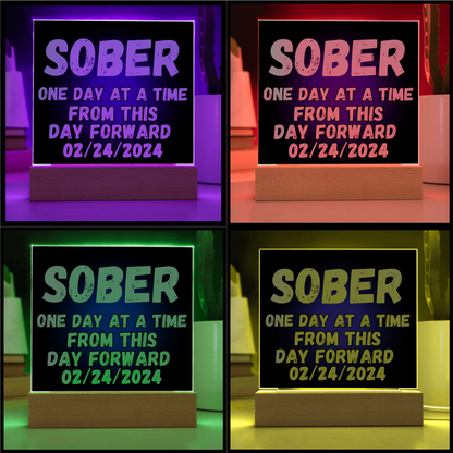 Square LED plaque with SOBER text and date, shown in four glowing border colors