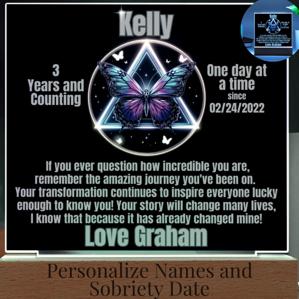 Personalized LED milestone plaque with illuminated butterfly graphic and wooden base