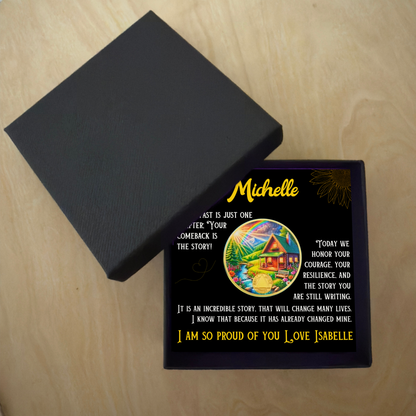 Personalized sobriety coin gift box with open black lid and Michelle card insert