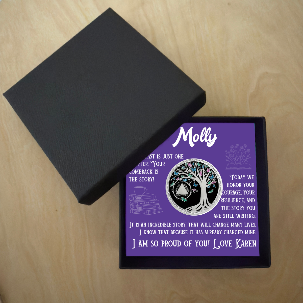 Sobriety coin gift set in purple box with black lid opened