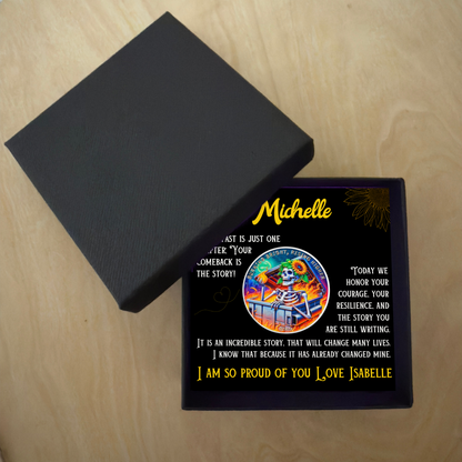 Black gift set with personalized coin card showing Michelle name and sunflower skeleton artwork