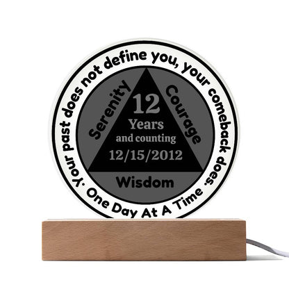 Circular LED sobriety date plaque with wooden base; reads 12 Years and Wisdom