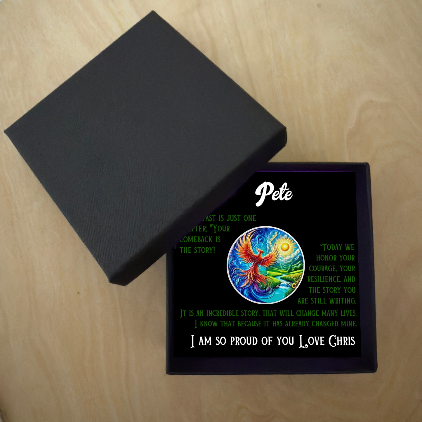 Personalized sobriety gift box with open lid and black card insert showing phoenix artwork coin