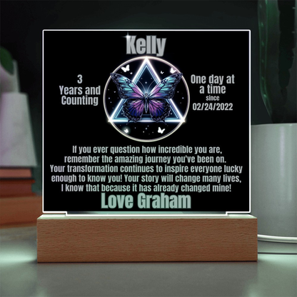 Personalized LED milestone plaque with butterfly light design, name Kelly, wooden base