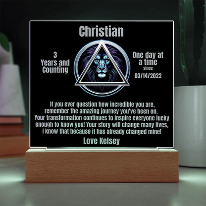 Square LED plaque on wood base with Christian triangle lion design and message
