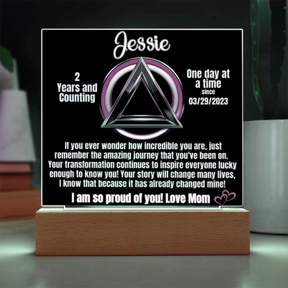 Personalized LED sobriety milestone plaque with green glow triangle motif on wooden base