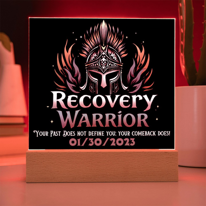LED acrylic plaque with warrior emblem and “Recovery Warrior” on wood base, red glow