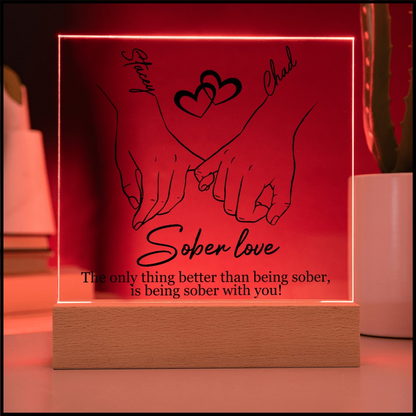Sober love LED plaque with hands-and-heart line art, wood base, red illuminated border