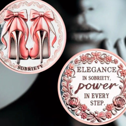 Pair of sobriety coins: pink heels design and floral 'Elegance... power' text