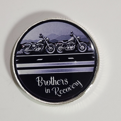 Sobriety coin with motorcycle illustration and 'Brothers in Recovery' text