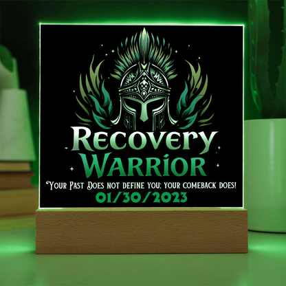 LED acrylic plaque with warrior emblem and “Recovery Warrior” on wood base, green glow