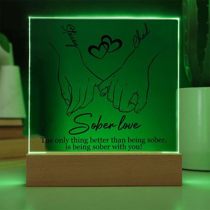 Sober love LED plaque with hands-and-heart line art, wood base, green illuminated border