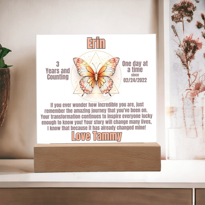 Butterfly LED sobriety plaque with wood base on mantel, name Erin