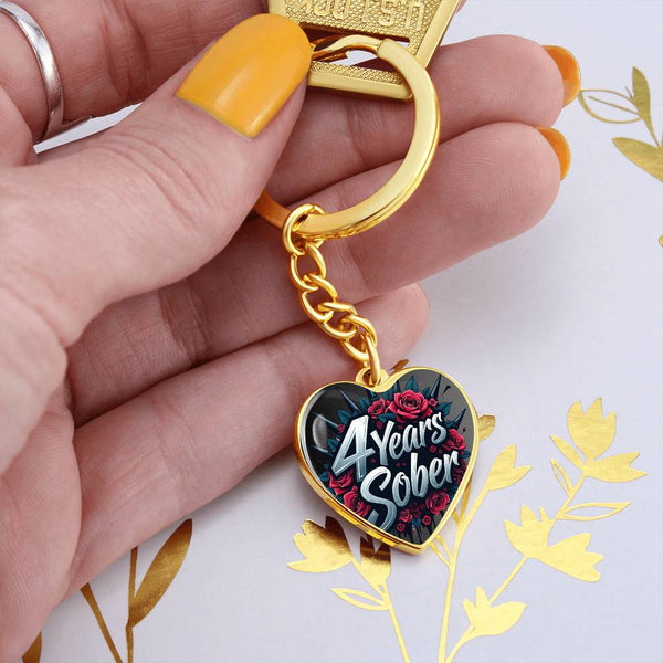 Gold heart keychain with "4 Years Sober" text and rose design