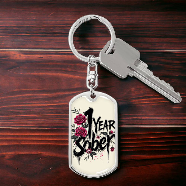 Steel dog tag keychain with swivel and oval tag engraved “1 Year Sober” with roses