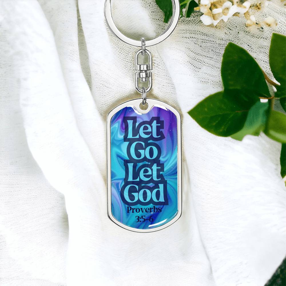 Steel dog tag keychain with swivel ring, blue front reading “Let Go Let God”