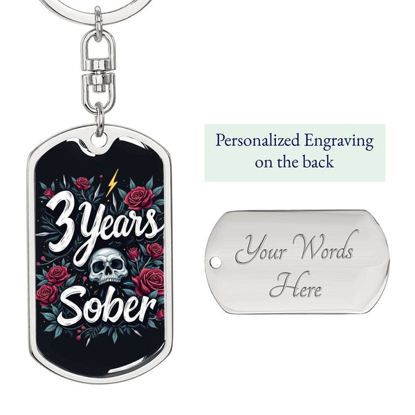 Silver dog tag keychain with engraved back plate reading “Your Words Here”.
