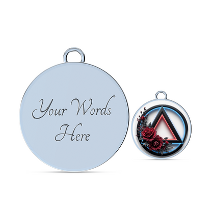 Bracelet with large round pendant engraved "Your Words Here" and small symbol charm