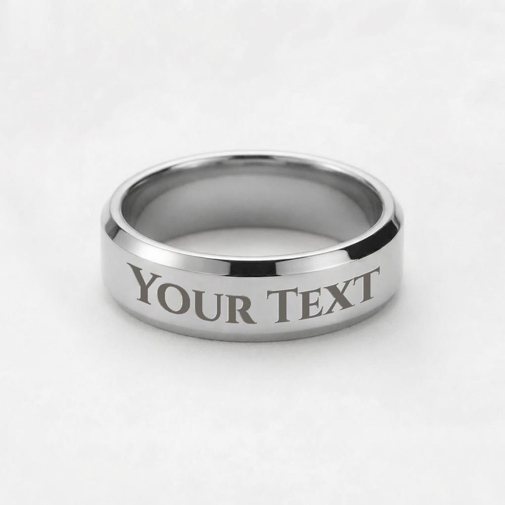 Engraved stainless steel band ring with “YOUR TEXT” lettering