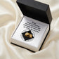 Open gift box with personalized clean-date message card, circular emblem inside