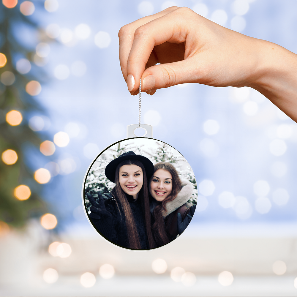 Round acrylic photo ornament back with two-women portrait, hanging silver cord