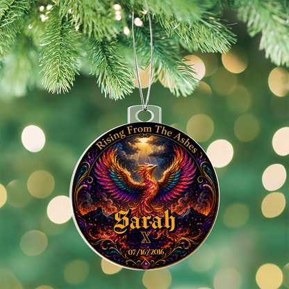 Phoenix acrylic ornament with name Sarah and date 07/16/2016, hanging on chain