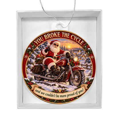 Round acrylic hanging ornament with Santa motorcycle scene inside a white gift box