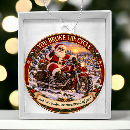Round acrylic Santa motorcycle ornament in a white square gift box with silver chain
