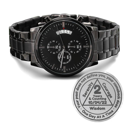 Black engraved recovery watch with linked metal bracelet and round black dial