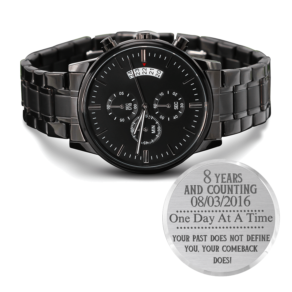 Black men’s chronograph wristwatch with metal link bracelet and multi-dial face