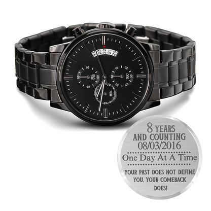 Black men’s chronograph wristwatch with metal link bracelet and multi-dial face