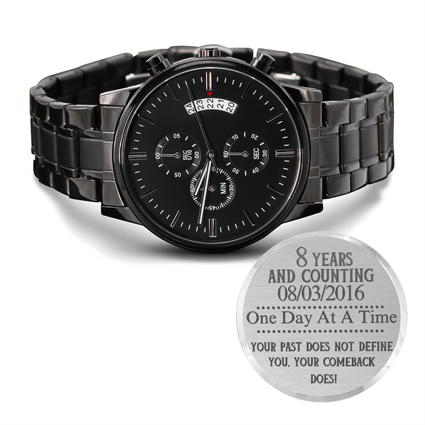 Black men’s chronograph wristwatch with metal link bracelet and multi-dial face