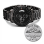 Black chronograph watch with metal link bracelet and engraved round keepsake charm
