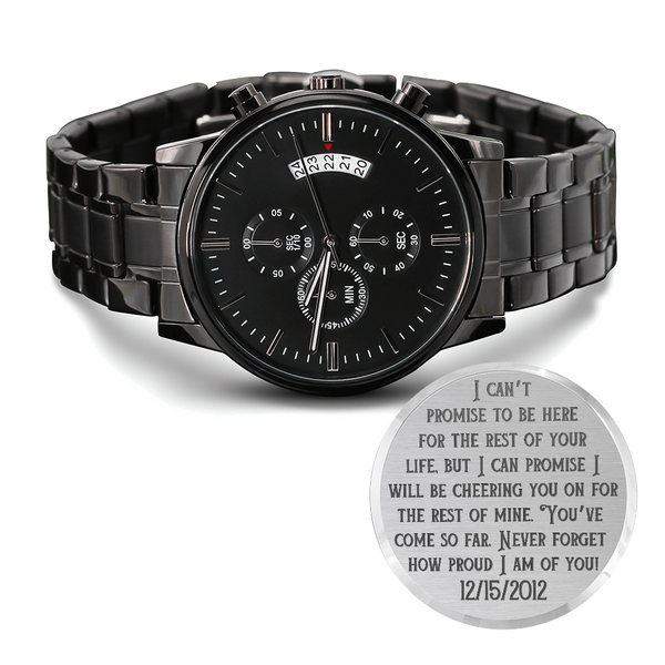 Black metal chronograph wristwatch with engraved circular sentiment plate