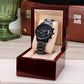 Men's black chronograph wrist watch in a red gift box with beige insert