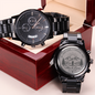 Black chronograph watch with engraved case-back, displayed in red and beige box