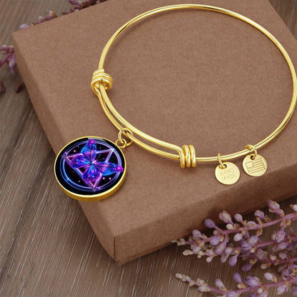 Butterfly recovery bracelet with gold bangle and round purple butterfly charm pendant