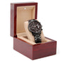 Men’s wristwatch in open mahogany-style storage box
