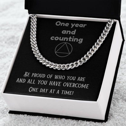 Silver-tone curb-link chain necklace in an open gift box