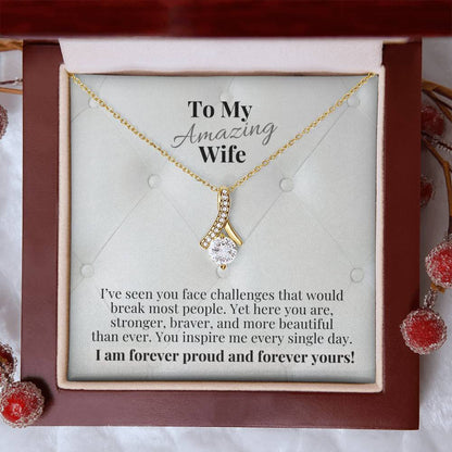 Gift box with gold-tone necklace and teardrop pendant, message card