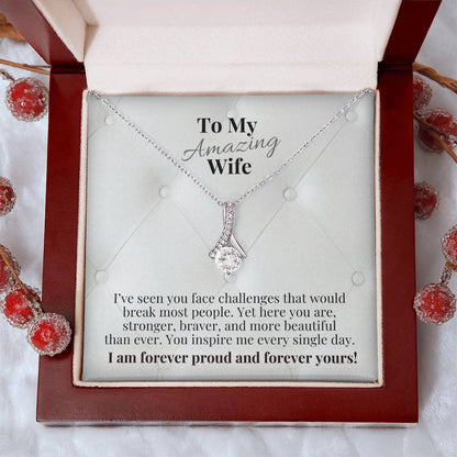 Gift box with silver-tone necklace and teardrop pendant, message card