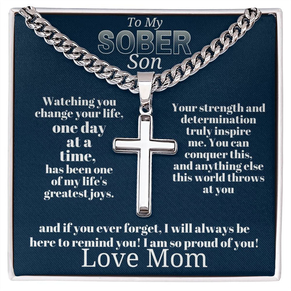 Silver-tone cross pendant necklace with curb chain and clasp
