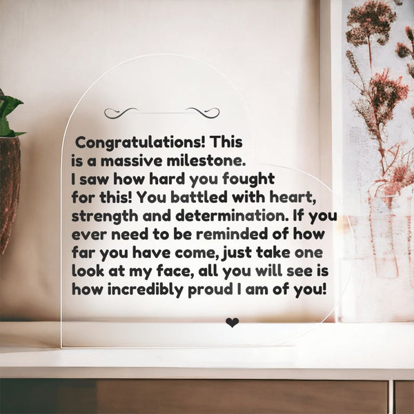 Heart-shaped acrylic plaque with congratulatory message and empowering quote