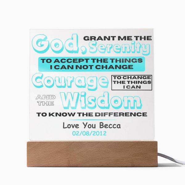 LED acrylic plaque close-up with glowing Serenity message and date on wooden base
